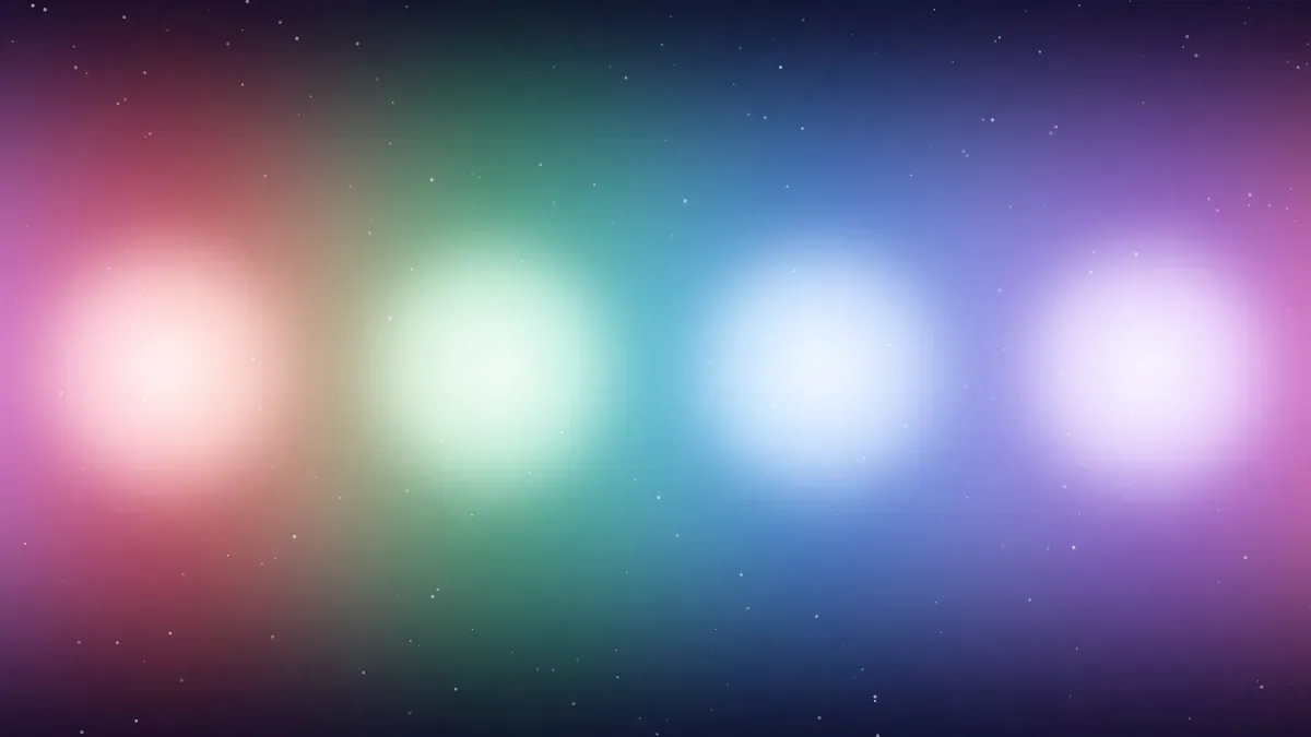 Colores del aura: cuatro brillos suaves en rojo, verde, azul y morado, uno al lado del otro sobre un cielo oscuro y estrellado